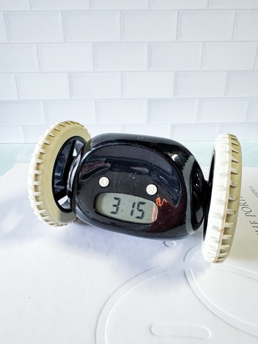 Clocky runaway alarm clock - clocky, on
